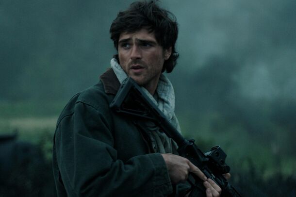 A survivor standing among the ruins in The Dog Stars