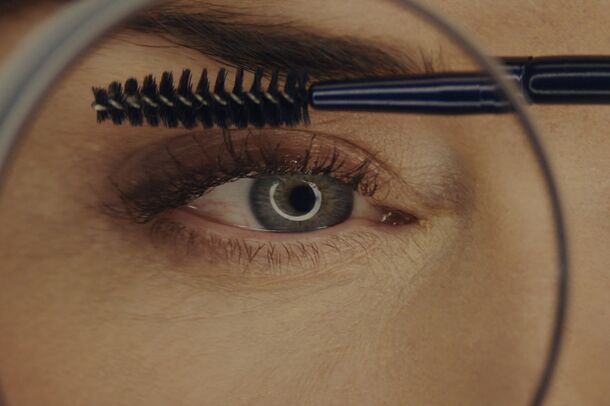 An eye examined through a magnifying lens in Disclosure Day