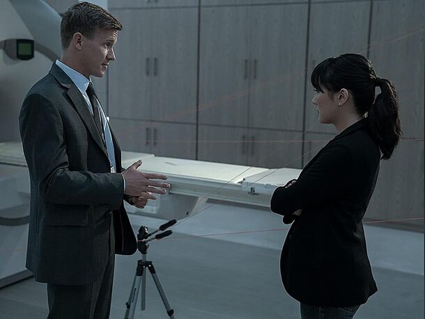 Warren Kole and Constance Wu in The Terminal List (2022). Kole plays NCIS Agent Josh Holder, who signed off on Boozer's suicide and becomes the first name on Reece's list
