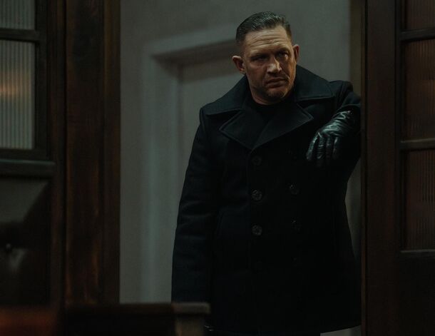 Tom Hardy as Harry Da Souza in a doorway in MobLand
