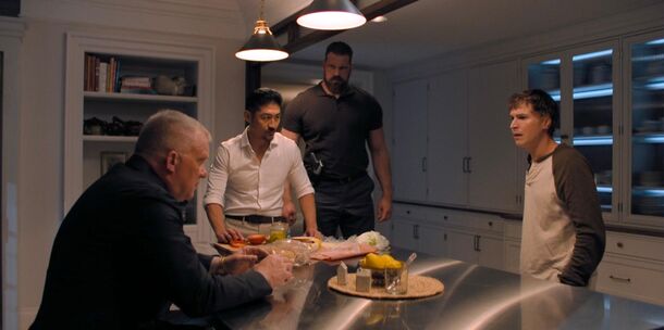 Quinn in the Beck kitchen with Zachary Beck and Paulie in Reacher