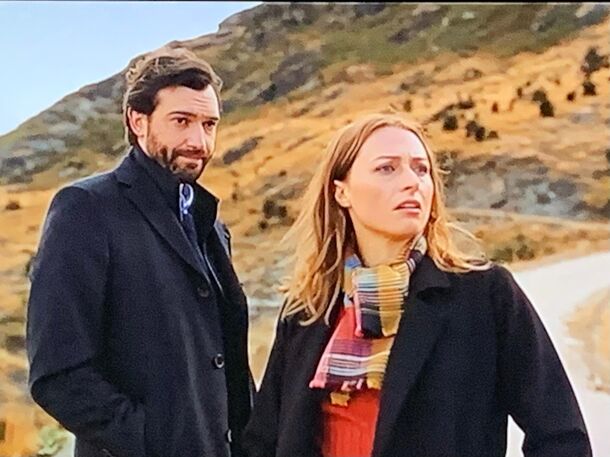 Two detectives on a hillside in A Remarkable Place to Die