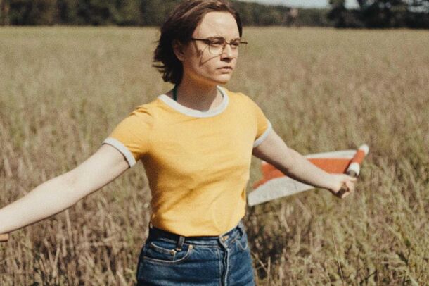 A girl in the summer field in Sound of Falling