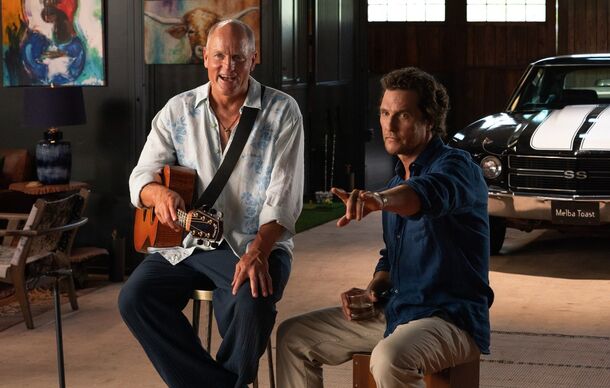 Woody Harrelson with a guitar and Matthew McConaughey in the ranch garage