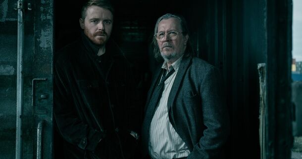 Jackson Lamb and River Cartwright in a dark Slough House doorway