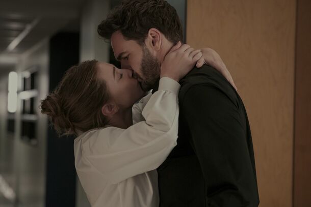 Olive and Adam in a corridor in The Love Hypothesis