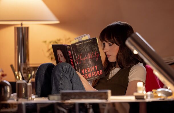 Lowen reading the unpublished manuscript in the Crawford house