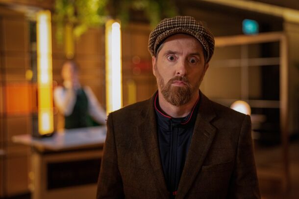 A Crown and Anchor regular in a flat cap in Ted Lasso