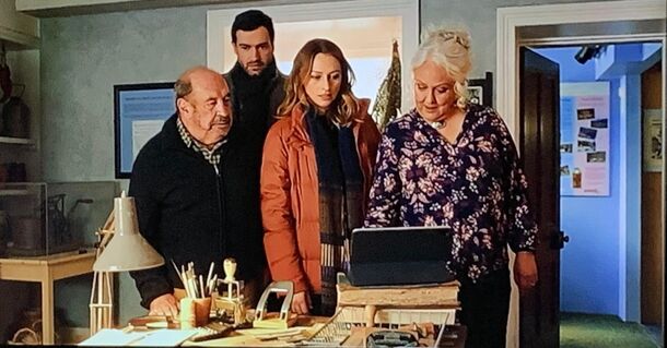 Chelsie Preston Crayford as Anaïs Mallory with family in A Remarkable Place to Die (2024). The season 1 finale reveals that Luke Staunton sent the man who killed her father, Charles