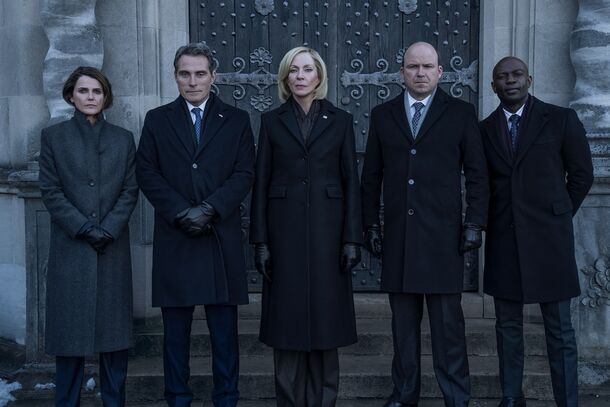 The cast of The Diplomat (2023) lined up outside a cathedral. The season 4 finale ends with Kate resigning at the G7 while American warships head for Britain's coast
