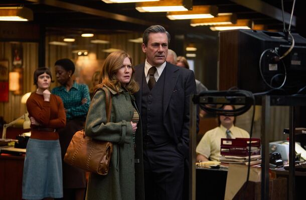Jon Hamm as news director Fred Heckman in a newsroom in American Hostage (2026). The real 1977 standoff ended in an insanity verdict that pushed Indiana to rewrite its law