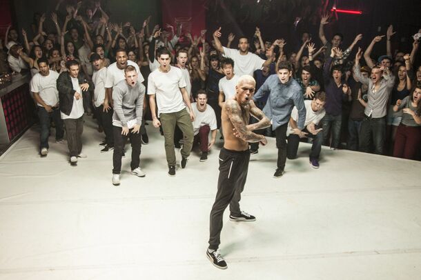 Chris Brown leading a dance crew in Battle of the Year (2013). His eight-month London sentence is suspended, and the only cost to his career is a year of no UK shows