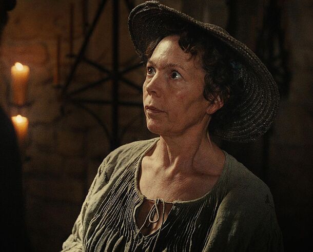 Olivia Colman as the Fisherwoman in Wicker (2026). The film ends with her, her Wicker Husband and the Wicker Baby leaving the village on the Basket Weaver's cart