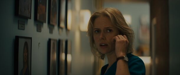 A frightened woman on the phone in Insidious: Out of the Further (2026). The film cost $18 million and has grossed about $157 million worldwide