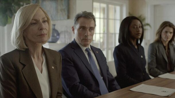Allison Janney, Rufus Sewell and Keri Russell at the negotiating table in The Diplomat (2023). Netflix ordered season 5 on October 29, two weeks after season 4 premiered