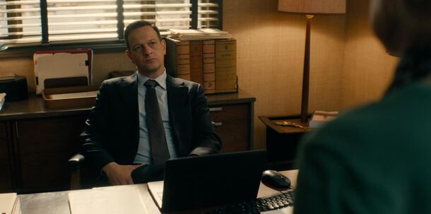 Dr. Martin Best talks to a patient across his desk in the Port Wenn surgery in Best Medicine