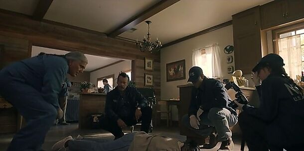Investigators work a crime scene inside a lodge in CBS prequel NCIS: Origins