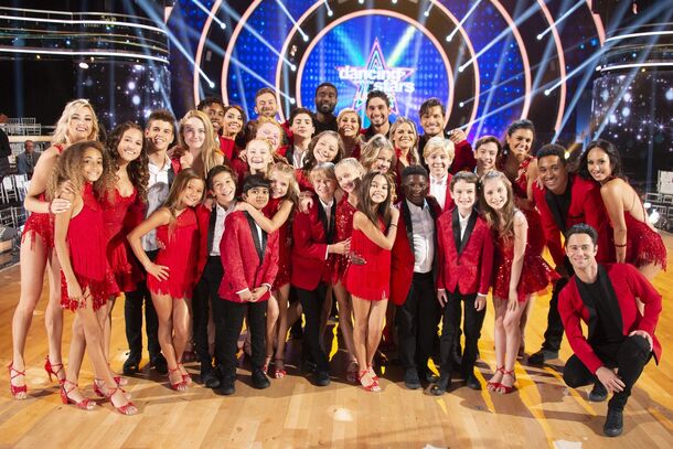 A couple mid-routine on the Dancing With the Stars floor; fan votes decide half of who goes home, and on season 35's premiere night the online half of that vote never counted.