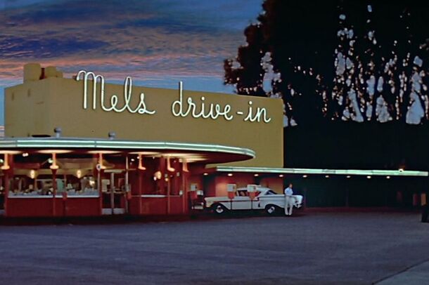 Mel's Drive-In diner glowing at dusk in American Graffiti
