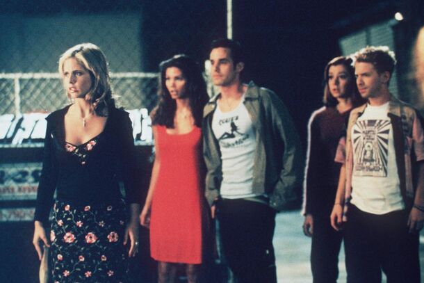 The cast of Buffy the Vampire Slayer by the school fence