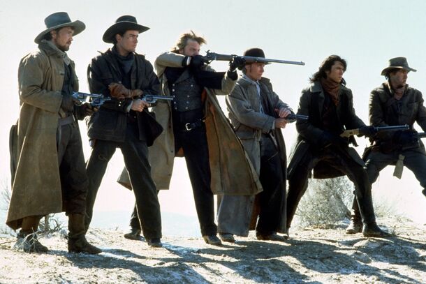 The Regulators with guns drawn in the snow in Young Guns