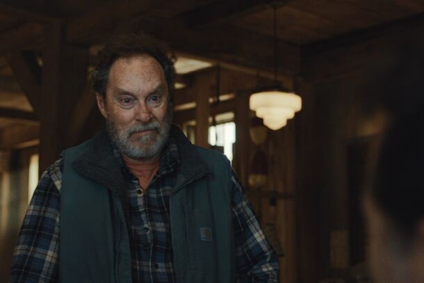 Stephen Root in a plaid shirt indoors in Widow's Bay