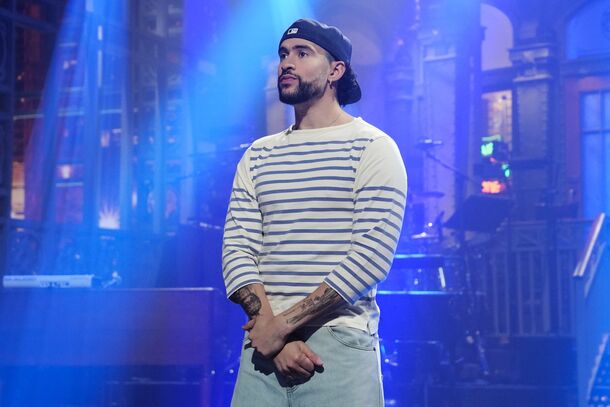 A host on the Saturday Night Live stage during the monologue