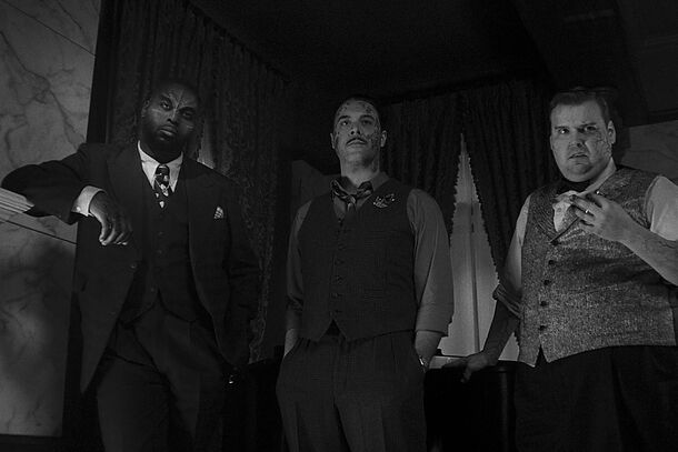 Spider-Noir characters in a black-and-white hallway