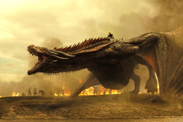A dragon over a burning battlefield in House of the Dragon