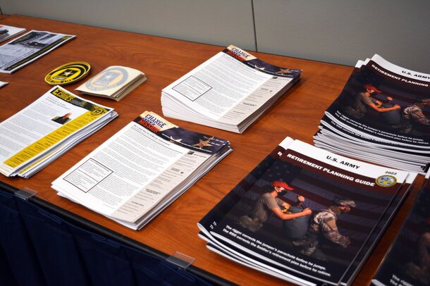Retirement planning brochures laid out on a table