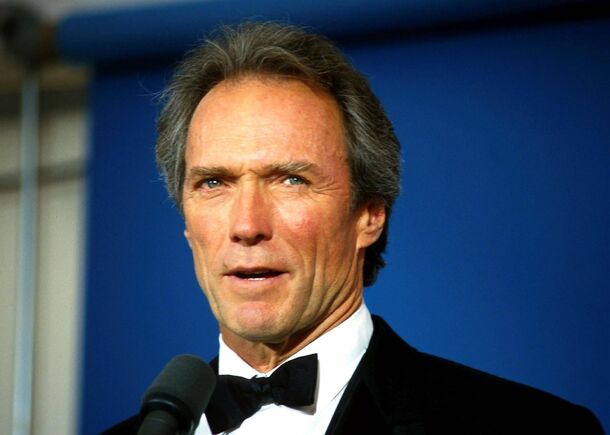 Clint Eastwood at a microphone — seven decades of refusing to self-agonize
