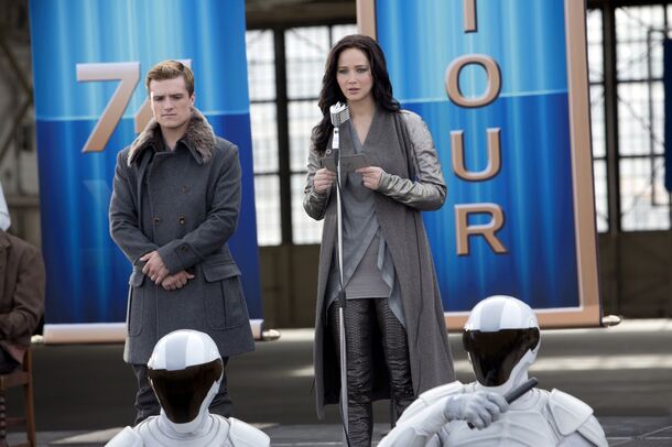 Josh Hutcherson and Jennifer Lawrence in The Hunger Games: Catching Fire (2013). Peeta survives the Quarter Quell, but ends the film in Capitol custody