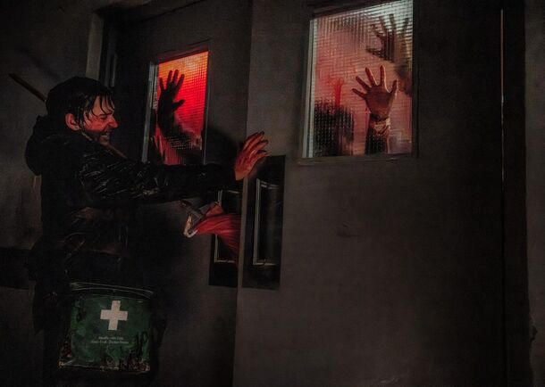Bloody handprints on the corridor windows in Zach Cregger's Resident Evil (2026). Chandler Riggs tried to release his fan film before the reboot hit theaters in September