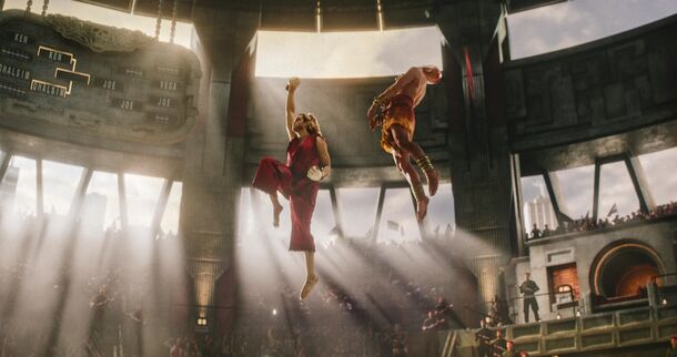 Ken and Dhalsim leaping across the tournament arena in Street Fighter (2026). The post-credits scene shows M. Bison recruiting Sagat, the final boss of the original arcade game