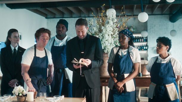 The kitchen crew in the dining room in The Bear (2022). In the finale, the real Michelin inspector turns out to be a diner they served months earlier, and the restaurant gets two stars