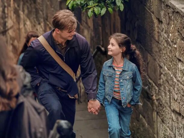Leo Woodall as Dexter walking with his daughter Jasmine in One Day (2024). The finale is set on July 15, 2007, with Dexter back in Edinburgh retracing his first day with Emma