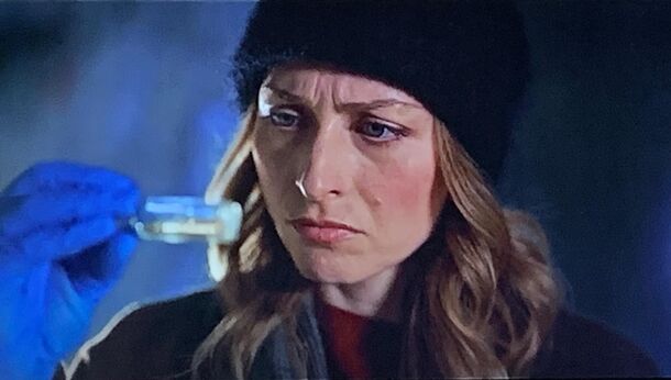 Chelsie Preston Crayford as detective Anais Mallory in A Remarkable Place to Die (2024). In episode 5, two bodies are found at a remote Queenstown campsite, one on top of the other