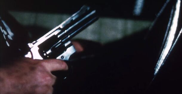 A revolver in the dark in Mikey and Nicky (1976). The night ends at dawn on Mikey's doorstep, where hitman Kinney, played by Ned Beatty, catches up with Nicky